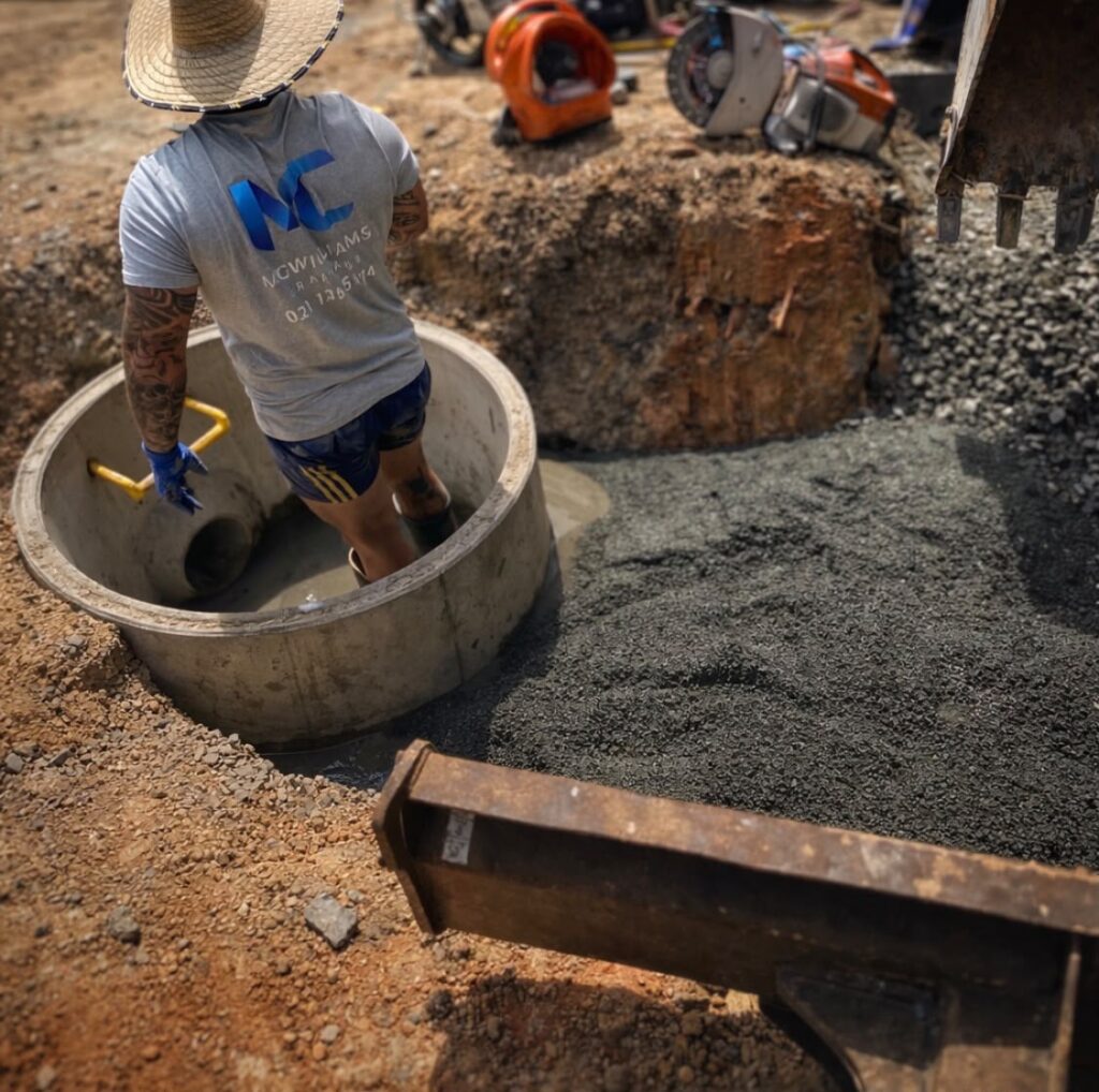 Drainlayer working